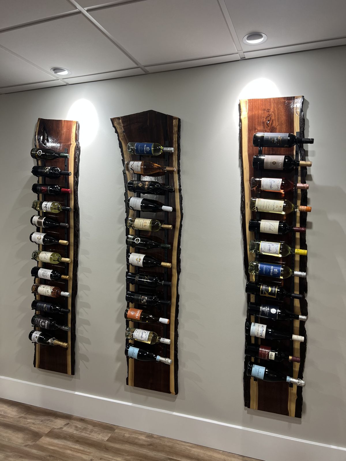Three walnut wine racks in daylight